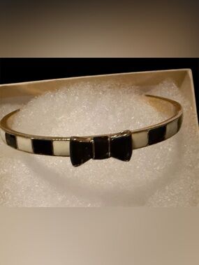 Kate Spade Take a Bow Bangle Bracelet Black & White Enamel Stripes Gold Plate